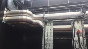 AC roof chiller pipework insulated and weather protected with aluminium cladding by Lagforce.