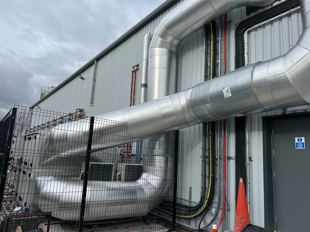 Large industrial HVAC ductwork with aluminium cladding