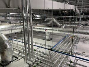Foil-faced insulation on ventilation ductwork and water services in Naas, Co. Kildare