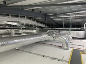Foil-faced insulation on ventilation ductwork and water services in Naas, Co. Kildare