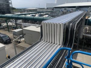 Formed metal cladding on external industrial services