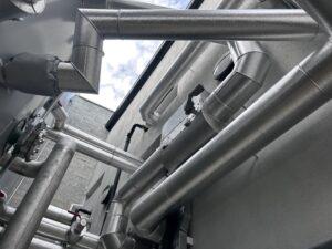 Aluminium cladding installed by Lagforce on external pipework in a new distillery in Galway Ireland